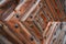 Old wooden gate with iron forged decor. Close-up, texture of old