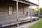 Old wooden home with rocking chair