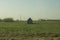 Old wooden house in the countryside. the house stands alone in the field