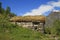 Old wooden house with grass roof in Norway