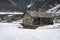 Old wooden house with snow in winter near Sindh bridge at at Sonamarg and was a gateway on ancient Silk Road along with Gilgit