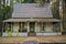 Old wooden house surrounded by trees used as Ranger Station, Calaveras Big Trees State Park, California