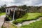 An old wooden house with waterwheel at Rio Grande do Sul