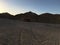 Old wooden hut in the evening in the desert.