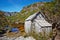 Old wooden hut by lakeside in Cradle Mountain Lake St. Clair Nat