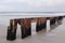 Old Wooden Jetty Ruin on Beach