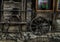 Old wooden parts of wagon standing near the house at farm