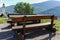 Old wooden picnic table in roadside rest area in Trentino, Italy