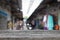 Old wooden planks with background is blurred image of residential community.