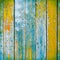 Old wooden planks painted with paint cracked by a rustic background