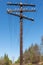 Old wooden power line pole