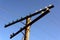 Old wooden power poles with glass insulators