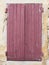Old wooden red brown peeling shutters in french provence house
