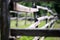 Old wooden rural corral fence in meadow