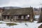 Old wooden rural house in a typical Carpathian village in winter. Ukraine