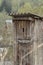 Old wooden rustic toilet in village