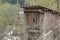 Old wooden rustic toilet in village
