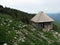 Old wooden sheepfold / cottage / cabin in the mountains