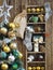 Old wooden shelf with Christmas decorations and balls on a wooden ancient background. Front blurred background with decorated