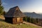 Old wooden shelter on the mountain meadow, pasture in slovak countryside