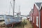 Old wooden ship on the bank of Wirksund pier in Denmark