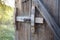 old wooden sliding lock mechanism on barn door