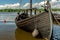 Old wooden sloop tied up at the port