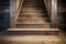 Old wooden staircase with handrails and balusters