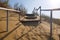 The old wooden stairs to the sand dunes. rise up. sunrise. Russia, Dagestan