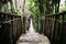 Old wooden suspension bridge over river