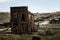 Old wooden tilted house with wooden support, cowboy village Bodie