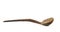 Old wooden used spoon with long handle on a white background