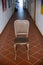 Old wooden vintage classical chair placed in the hallway.