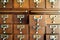 Old wooden vintage Medicine drawer cabinet. Catalog file cabinet.
