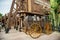 Old wooden wagon in the Far West area of theme park Port Aventura in city Salou, Spain.