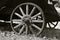 Old wooden wagon wheel with spokes