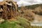 Old wooden waterwheel and Cabriel River on its way through Casas del Rio village, Albacete, Spain.