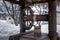 Old wooden well. Beautiful architecture. Snowy cloudy day.