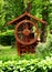 Old wooden well with bin and steering weel