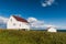 Old wooden white house and shed