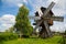 Old wooden windmill in countryside in Russia
