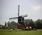 Old wooden windmill named Weijpoortse Molen in Nieuwerbrug in the Netherlands.