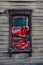 Old wooden Windows with carved patterns in Omsk.