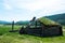 Old wooden Yurt with moss on the roof. destroyed Yurt.