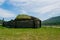 Old wooden Yurt with moss on the roof. destroyed Yurt.