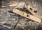 Old woodworking hand tool: wooden plane, chisel and drawing knife in a carpentry workshop on dirty rustic table covered