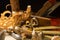 old woodworks tools: wooden planer, hammer, chisel in a carpentry workshop on wood background