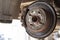 Old worn brake discs on a passenger car. Car on a lift in a car service