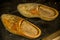 Old worn clogs of a farm worker