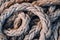 Old worn frayed ship ropes as background